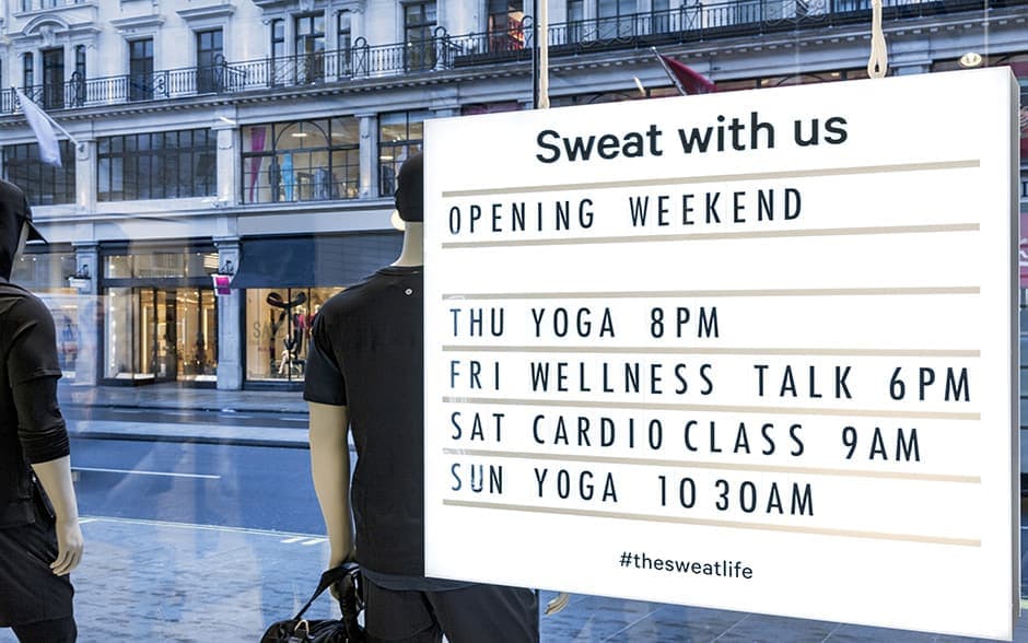 Retail shop advertising exercise classes in window display