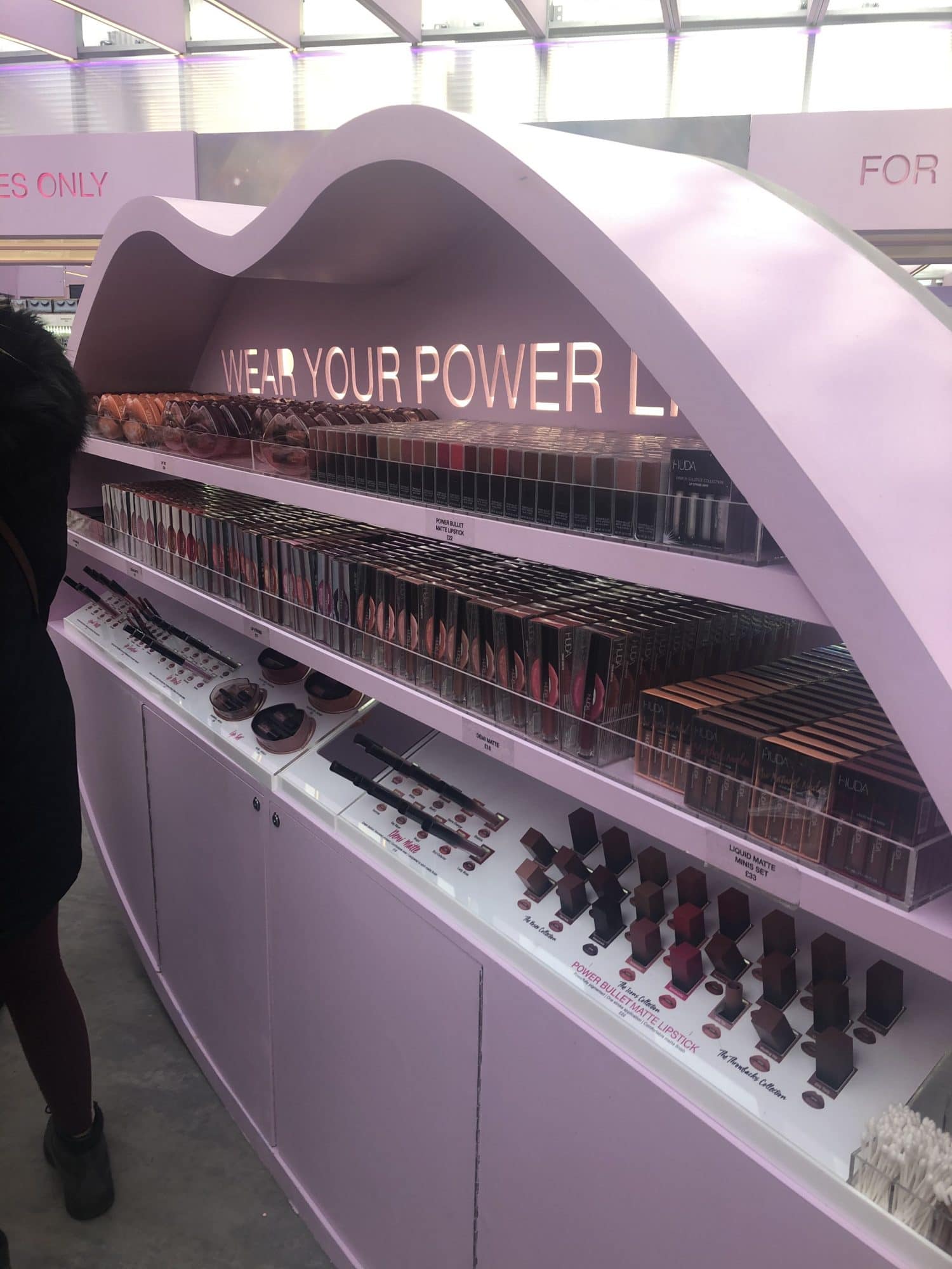 Glossier lipstick in pop-up store